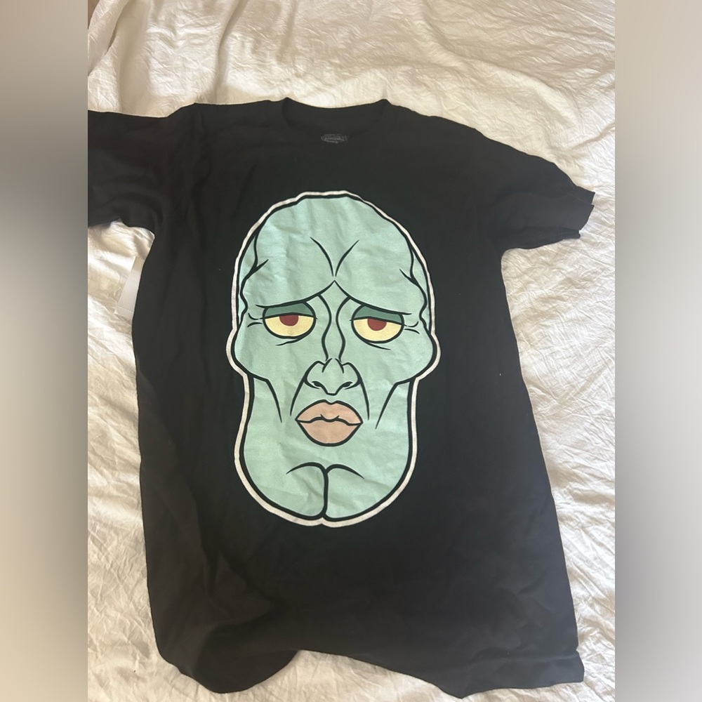 Handsome squid-ward novelty tee.  Journeys.